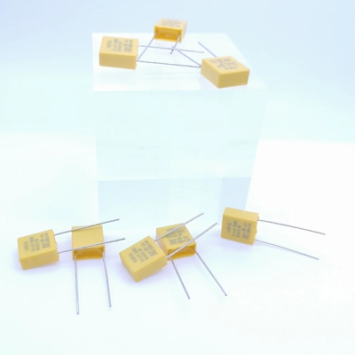 Kapasitor Pelepas Tekanan Resistif Dan Kapasitif 0.1UF 310V P7.5MM Warna Kuning